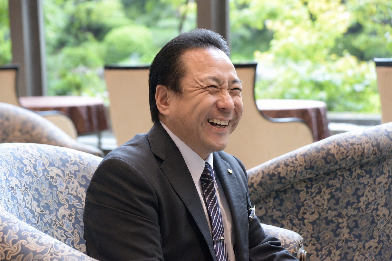 笑顔で振り返る浅山典之さん